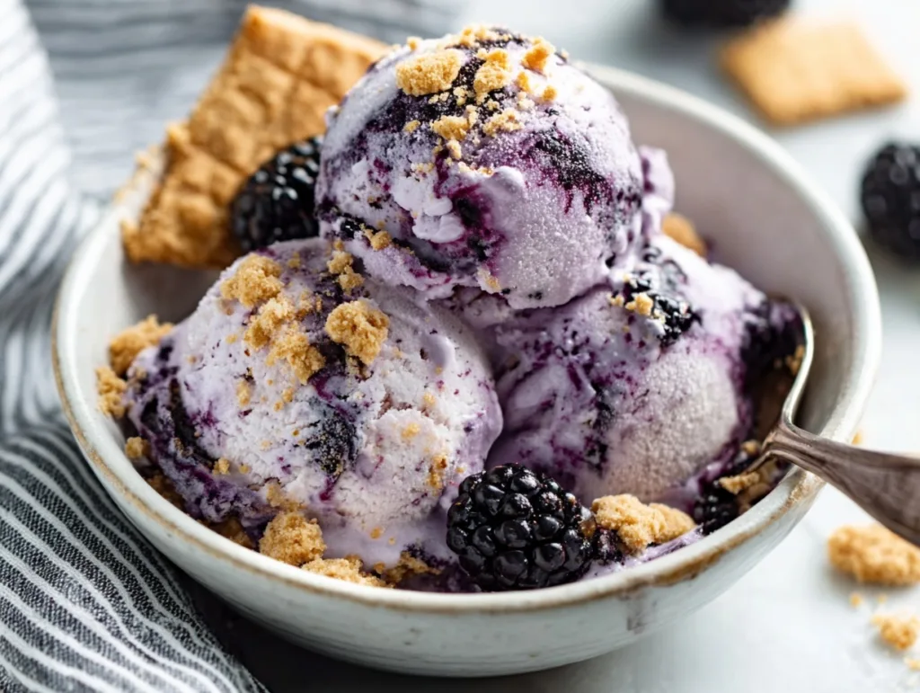 Blueberry cottage cheese ice cream scoops with graham crackers and berries