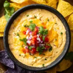 Cottage Cheese Queso – Creamy 3-Ingredient Recipe 7 Cottage cheese queso topped with cilantro and onion served with tortilla chips