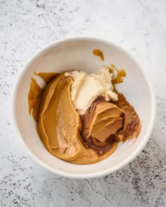 4-Ingredient Chocolate Peanut Butter No Bake Cookies (High-Protein & Ready in 5 Minutes) 13 Bowl with peanut butter, protein powder, and honey before mixing for no bake cookies