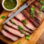 5-Ingredient Air Fryer Tri Tip – Juicy, Simple & Protein-Packed! 9 Air fryer tri tip steak with chimichurri and knife on board