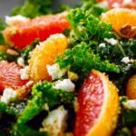Macro view of winter citrus and kale salad with orange, grapefruit, and feta