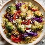 Roasted veggie and quinoa bowl with broccoli, brussels sprouts, and feta