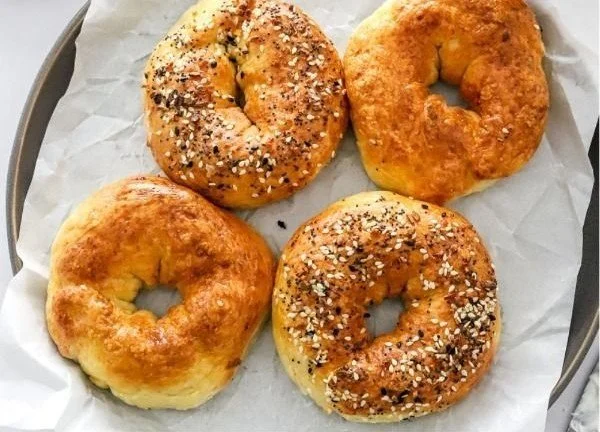 Air Fryer Protein Bagels 4 Air Fryer Protein Bagels fresh out of the air fryer, golden brown and fluffy.