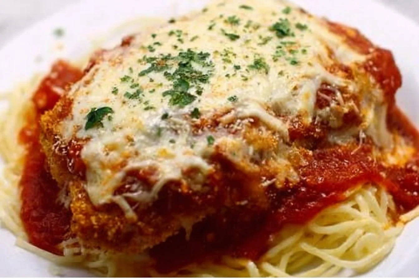 Baked Chicken Parmesan 5 Delicious baked chicken parmesan with cheese and marinara sauce