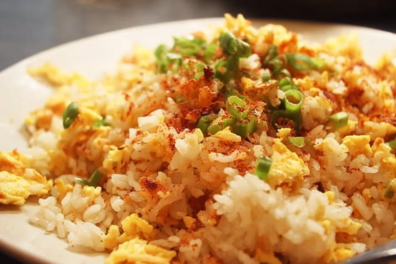 Bowl of Breakfast Fried Rice with fresh vegetables and eggs