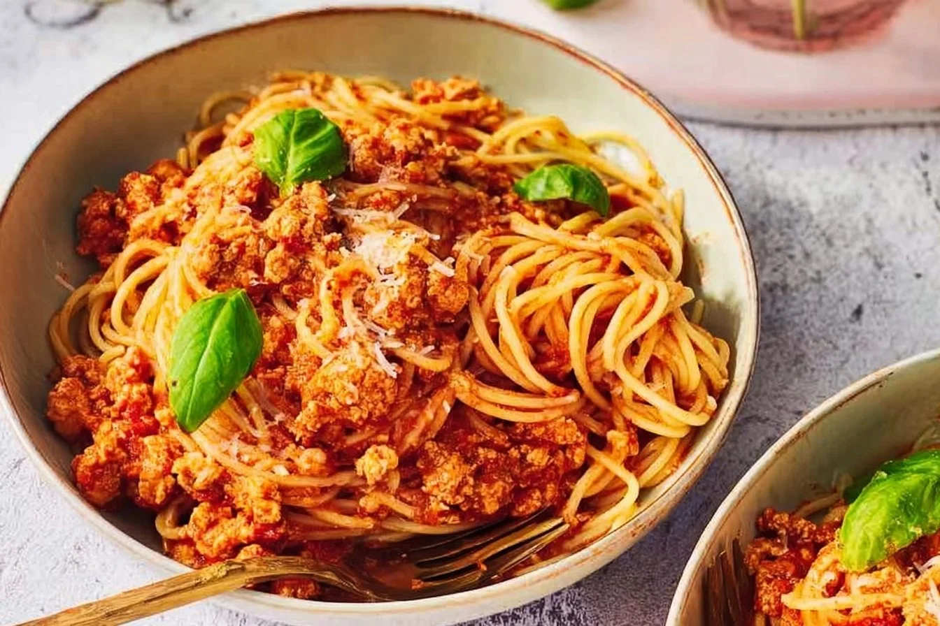 Delicious Ground Chicken Parmesan served with pasta and cheese