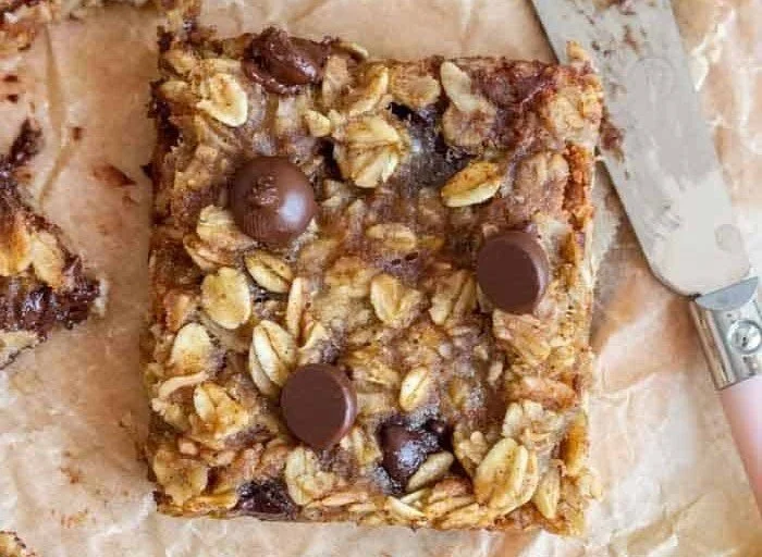 Healthy homemade banana oatmeal bars with oats and ripe bananas